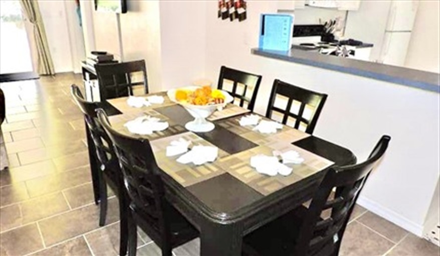  Dining space just off the kitchen. Ref 80.Stunning Villa with private pool. Near Disney, Eagle Point in Eagle Pointe, Kissimmee, Orlando