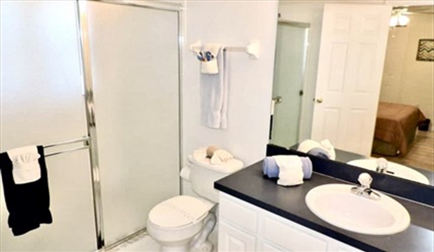 One of 3 bathrooms, this one with walk in shower. Ref 80.Stunning Villa with private pool. Near Disney, Eagle Point in Eagle Pointe, Kissimmee, Orlando