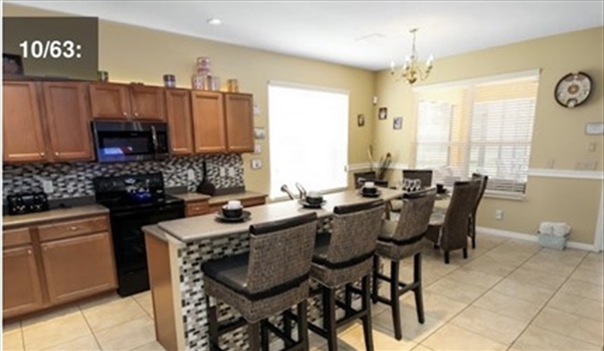 Full equipped kitchen with breakfast bar. Ref 701BV. Villa at Bella Vida with own South facing pool., Games room & near to Disney in Bellavida Resort, Kissimmee, Orlando