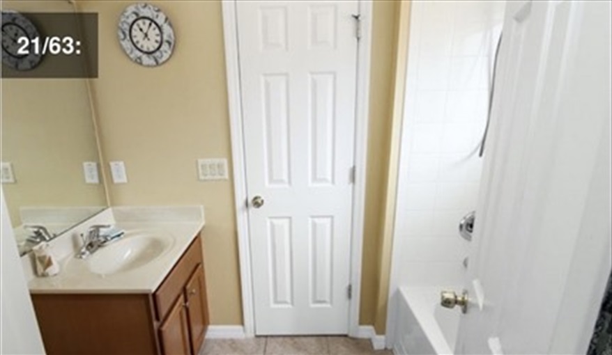 Bathroom with shower and bath. Ref 701BV. Villa at Bella Vida with own South facing pool., Games room & near to Disney in Bellavida Resort, Kissimmee, Orlando