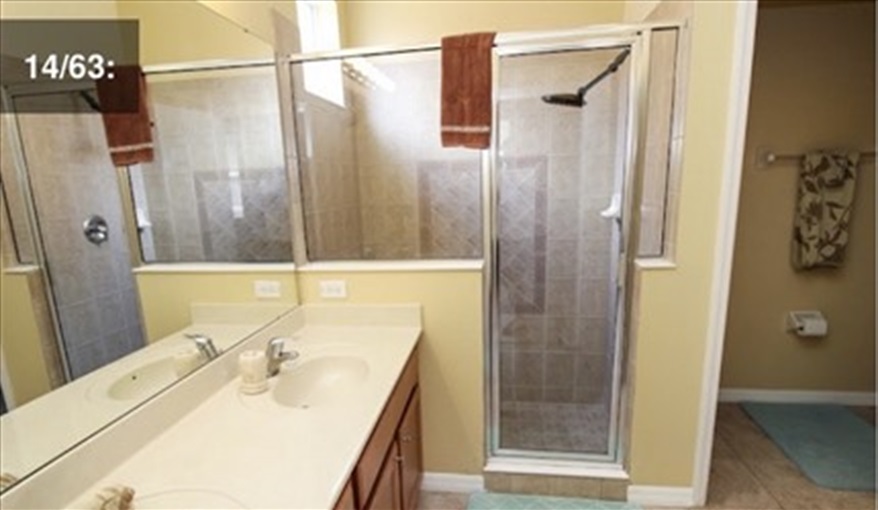 Bathroom with open shower. Ref 701BV. Villa at Bella Vida with own South facing pool., Games room & near to Disney in Bellavida Resort, Kissimmee, Orlando