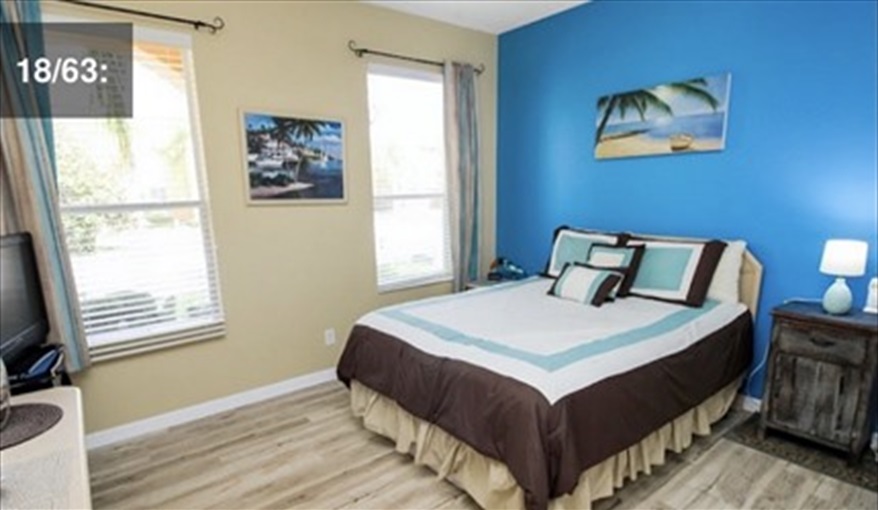 UPPER FLOOR: Bedroom 4: Queen bed and TV. Ceiling fan. Ref 701BV. Villa at Bella Vida with own South facing pool., Games room & near to Disney in Bellavida Resort, Kissimmee, Orlando