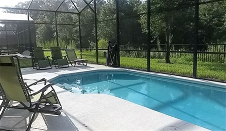 Sit, relax and enjoy the Florida sunshine & the conservation view. Ref 701BV. Villa at Bella Vida with own South facing pool., Games room & near to Disney in Bellavida Resort, Kissimmee, Orlando