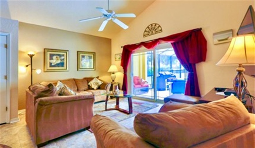 Main sitting area with plenty of cosy seating. Ref 114. Modern family villa own pool, near Disney. Silver Creek in Silver Creek, Clermont, Orlando