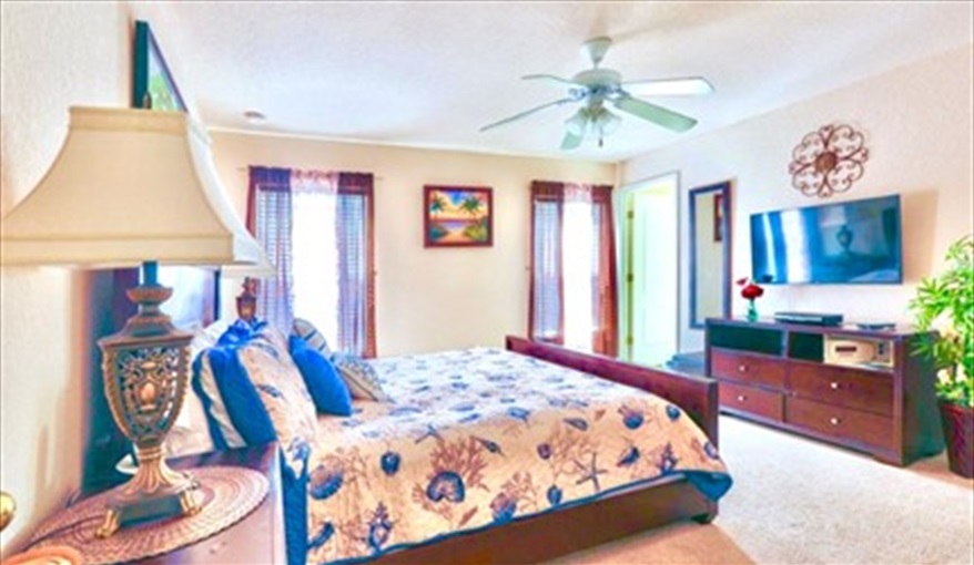 Bedroom 2: King size bed with plenty of storage. Ref 114. Modern family villa own pool, near Disney. Silver Creek in Silver Creek, Clermont, Orlando