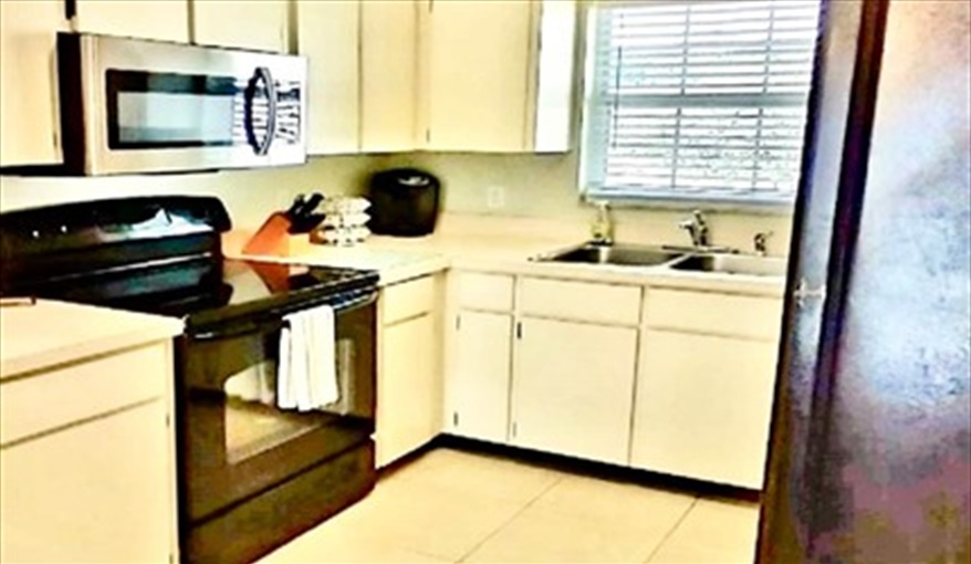 Fully equipped kitchen. Ref 993PF. Family home, free BBQ. Near Disney. Pet friendly in Lindfields, Kissimmee, Orlando