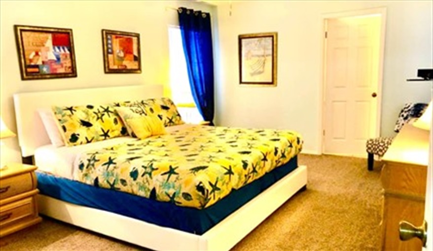 Bedroom 1: King size bed. Ref 993PF. Family home, free BBQ. Near Disney. Pet friendly in Lindfields, Kissimmee, Orlando
