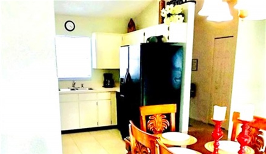 Dining seating is just off the kitchen. Ref 993PF. Family home, free BBQ. Near Disney. Pet friendly in Lindfields, Kissimmee, Orlando