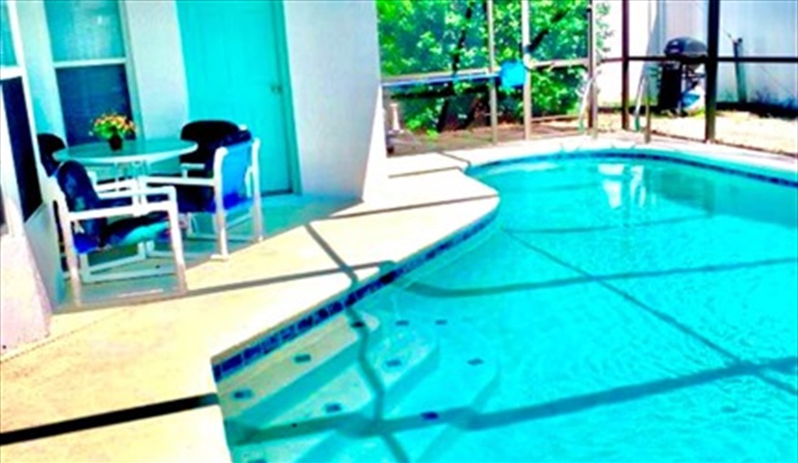 Plenty of deck space around the pool. Ref 993PF. Family home, free BBQ. Near Disney. Pet friendly in Lindfields, Kissimmee, Orlando
