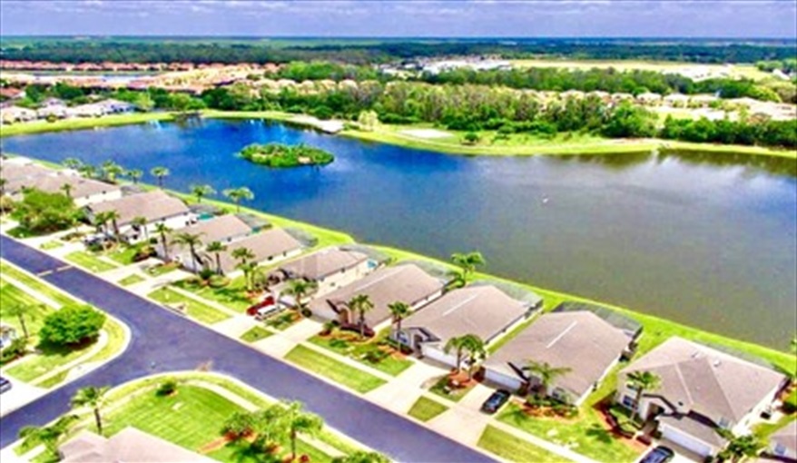 Ariel view of one of the lakes on Lake Berkley. Ref 17. Lake Berkley. Superb Villa , own pool. BBQ. Nr Disney. Gated resort in Lake Berkley Resort, Kissimmee, Orlando