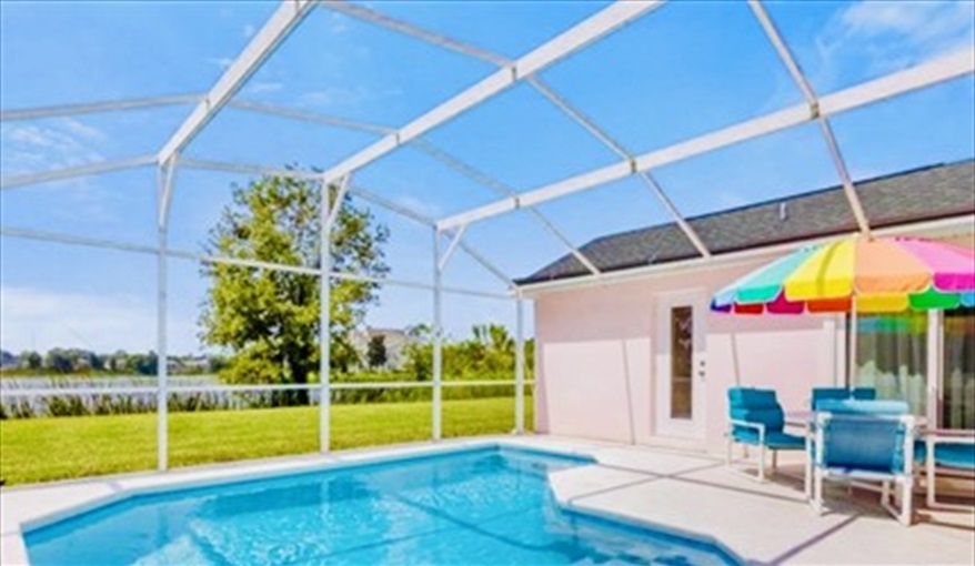 Al fresco dining. ref 996PF. Stunning villa. South facing pool. Pet friendly in Town Centre Reserve, Davenport, Orlando