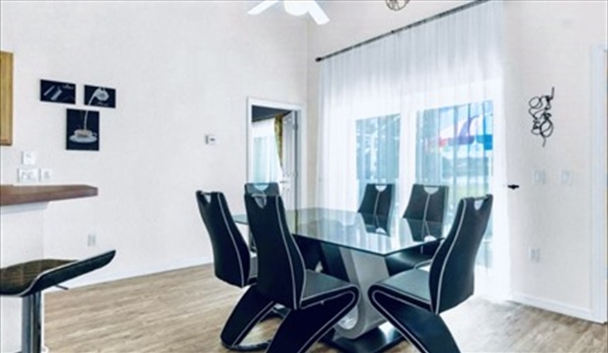Dining area. ref 996PF. Stunning villa. South facing pool. Pet friendly in Town Centre Reserve, Davenport, Orlando