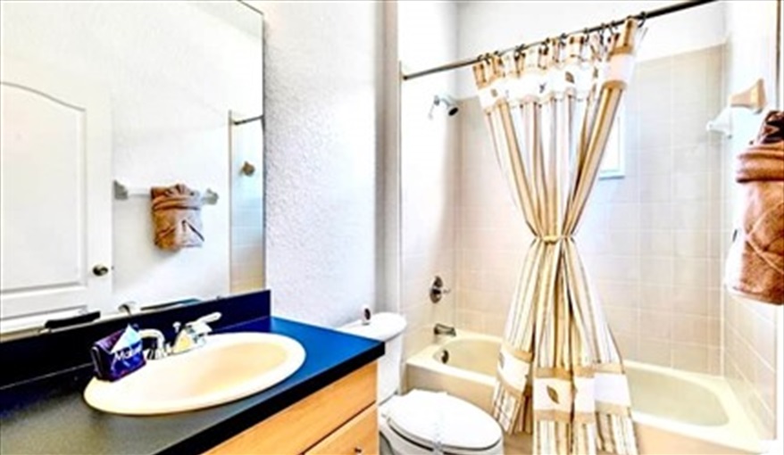 Shower over bath. Ref 89. Stunning Villa on Highlands Reserve golf course in Highlands Reserve, Davenport, Orlando