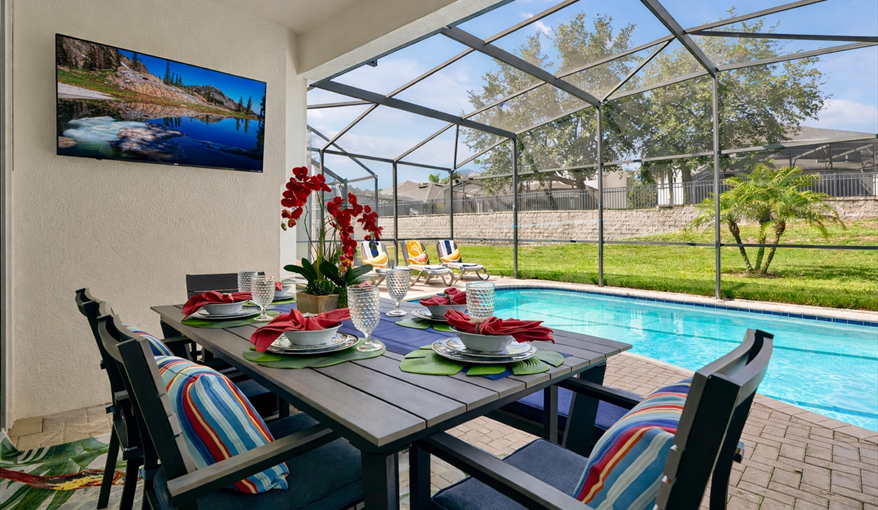 Poolside dining & TV lounge — your perfect Florida retreat.. Sunshine Villa at Windsor Hills  in Windsor Hills Resort, Kissimmee, Orlando