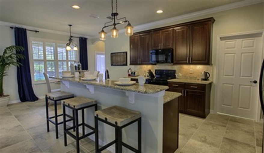 Open Kitchen. The Villa Watersong, Platinum Executive Home in Watersong, Davenport, Orlando