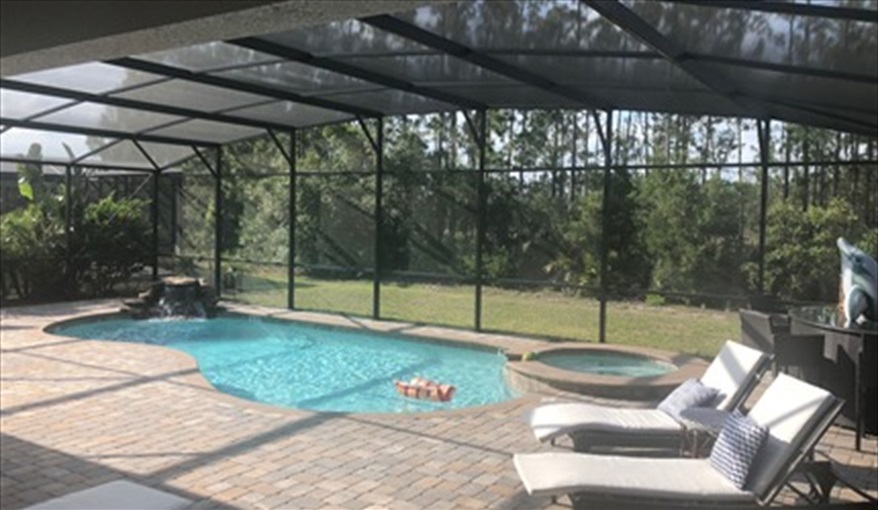 Pool Side. The Villa Watersong, Platinum Executive Home in Watersong, Davenport, Orlando