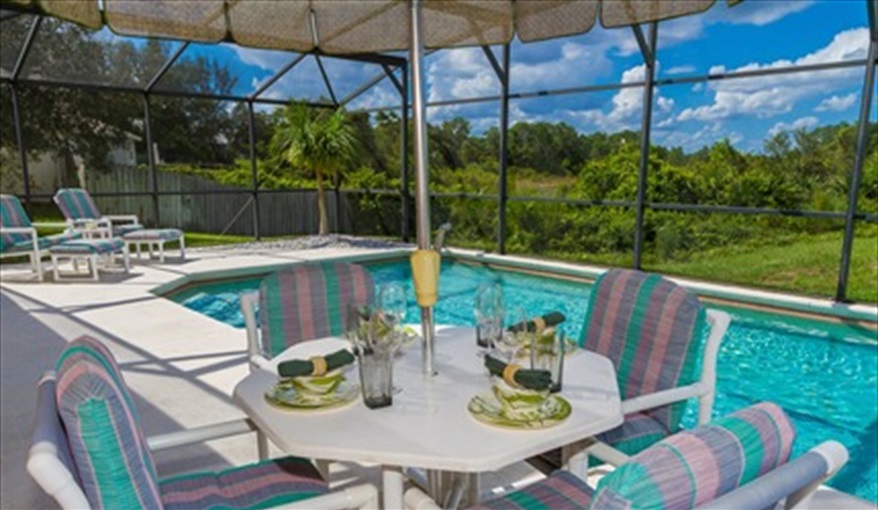Conservation view when you dine on the pool deck. Ourfloridadream at Sunridge Woods, Davenport in Sunridge Woods, Davenport, Orlando