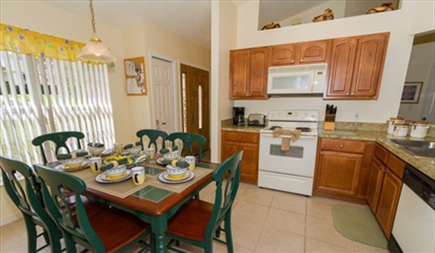 Kitchen and breakfast area. Ourfloridadream at Sunridge Woods, Davenport in Sunridge Woods, Davenport, Orlando