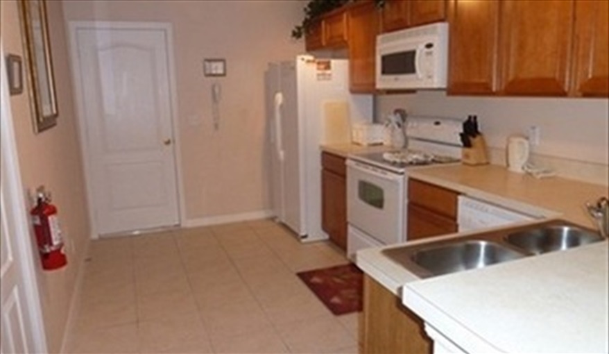 Kitchen. Pluto's Palace Florida Villa in Sandy Ridge, Davenport, Orlando
