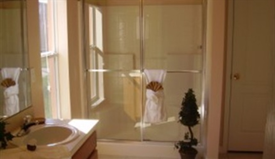 Master ensuite bathroom. Pluto's Palace Florida Villa in Sandy Ridge, Davenport, Orlando