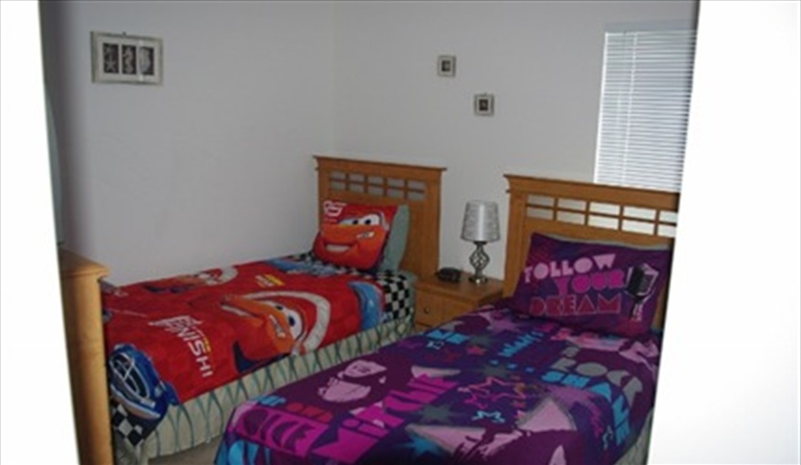 themed bedding for twin. Doorway to Disney in Emerald Island Resort, Kissimmee, Orlando