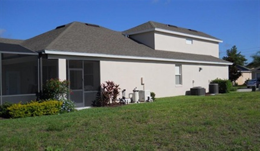 Villa Side View 1. Florida Palms (Trip Advisor Travelers Choice Award 2020) in Calabay Parc at Tower Lake, Haines City, Orlando