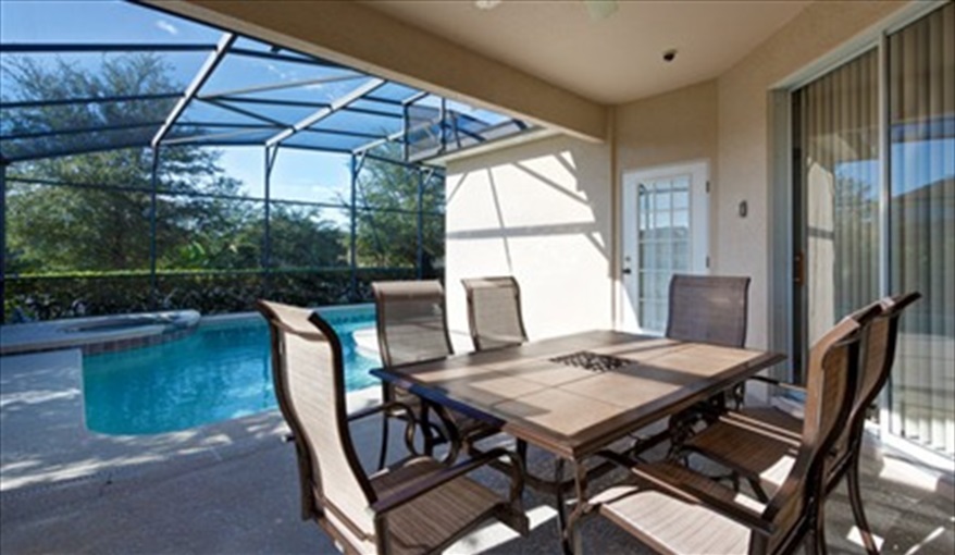 Covered Lanai Area. Florida Palms (Trip Advisor Travelers Choice Award 2020) in Calabay Parc at Tower Lake, Haines City, Orlando