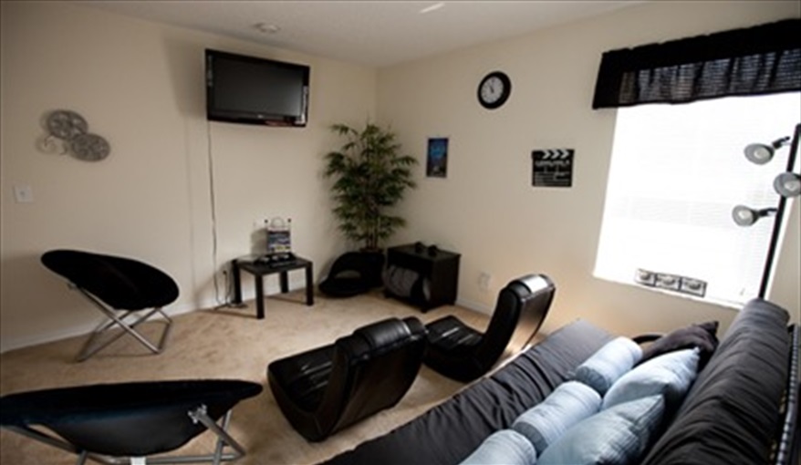 Unique Media Room perfect for those who enjoy media, with TV, DVD, PS2 & games. Leila's Sunrise - 7 Bedroom Deluxe Villa with Pool in Emerald Island Resort, Kissimmee, Orlando
