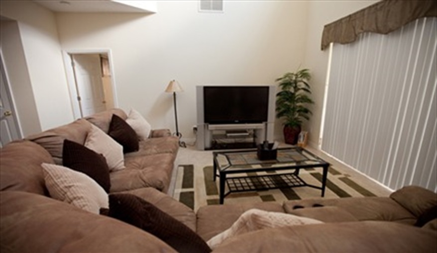 and enjoys a large corner sofa looking out over the pool. Leila's Sunrise - 7 Bedroom Deluxe Villa with Pool in Emerald Island Resort, Kissimmee, Orlando