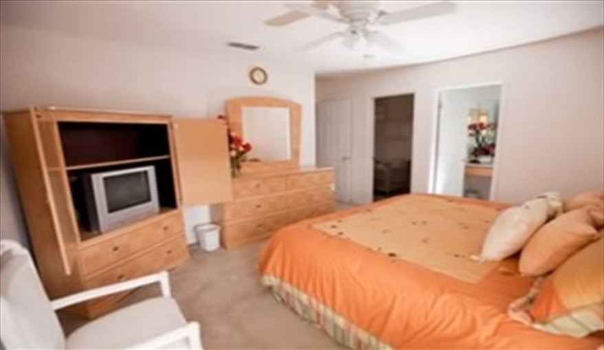 with luxurious linens, TV & wardrobes. Cal-Cierra Retreat - 7 Bedroom Deluxe Villa with Pool in Emerald Island Resort, Kissimmee, Orlando