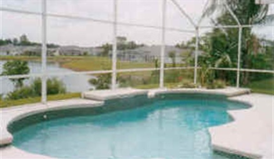 A Great Pool Area With Views Out Over A Lake. The Palms in Sunridge Woods, Davenport, Orlando