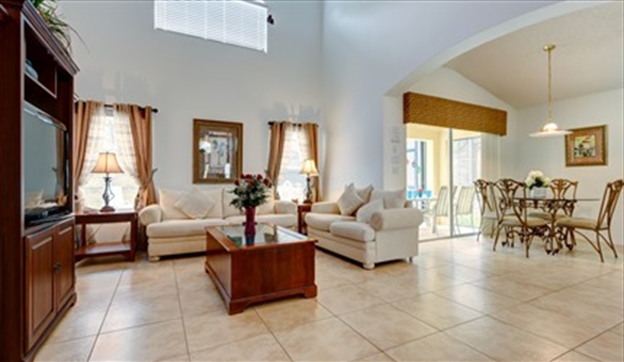 Skc villa family room into breakfast nook. Secret Key Cove Villa in Emerald Island Resort, Kissimmee, Orlando