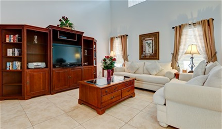 Skc villa family room. Secret Key Cove Villa in Emerald Island Resort, Kissimmee, Orlando