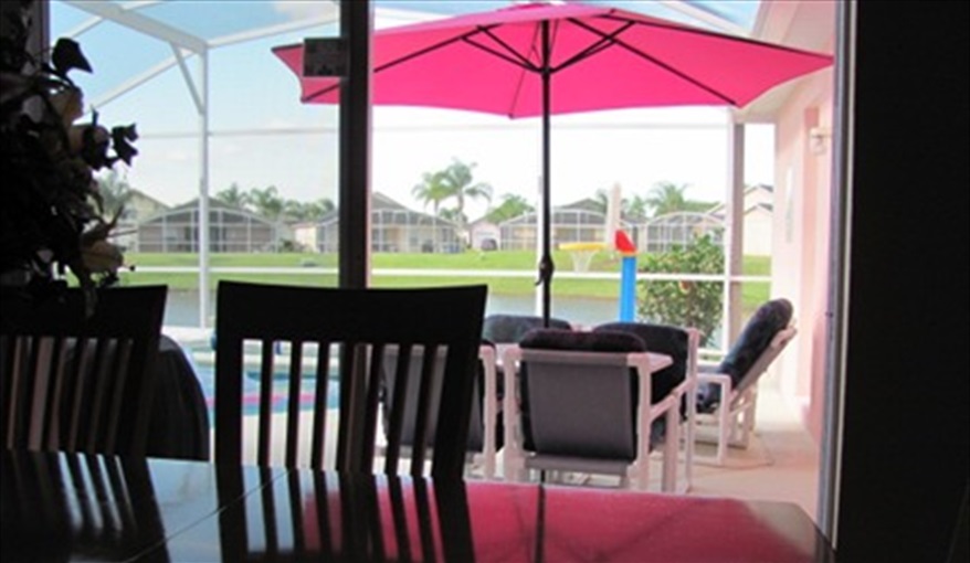 Looking out on to the pool deck. FAMILY-FRIENDLY 4-BED VILLA in very popular, beautiful, quiet, gated resort community!! GREAT LOCATION, close to DISNEY!!   in Reserve at Town Center, Davenport, Orlando