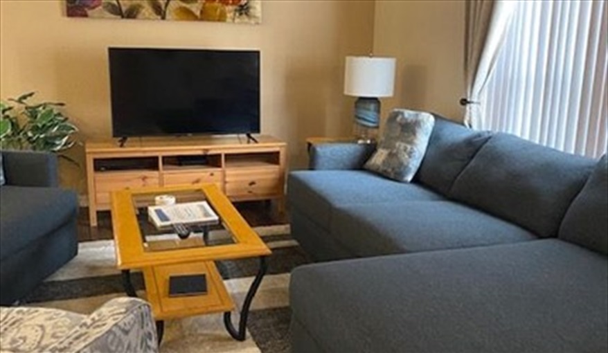 Open plan living room area. FAMILY-FRIENDLY 4-BED VILLA in very popular, beautiful, quiet, gated resort community!! GREAT LOCATION, close to DISNEY!!   in Reserve at Town Center, Davenport, Orlando
