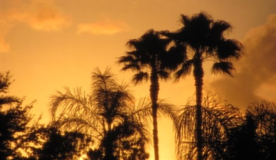 Sunset from pool deck. FAMILY-FRIENDLY 4-BED VILLA in very popular, beautiful, quiet, gated resort community!! GREAT LOCATION, close to DISNEY!!   in Reserve at Town Center, Davenport, Orlando