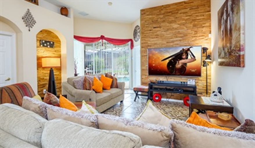 Comfortable lounge with direct access to pool area. Los Margarita  - 5 STAR Executive Villa in Calabay Parc at Tower Lake, Haines City, Orlando