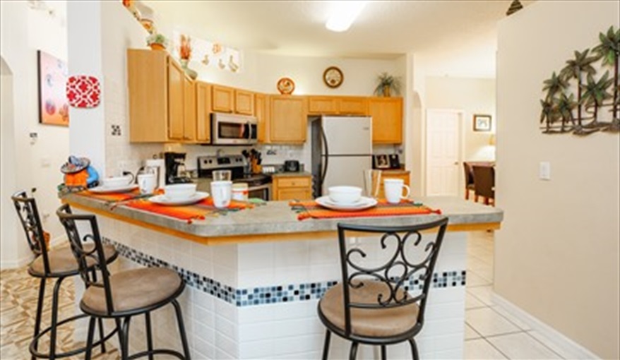 Breakfast bar with seating. Los Margarita  - 5 STAR Executive Villa in Calabay Parc at Tower Lake, Haines City, Orlando