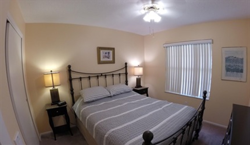 First bedroom with queen bed. Luxury villa, 3 Bedrooms, 2 Baths with stunning pool and games room in Indian Ridge, Kissimmee, Orlando