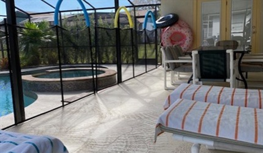 Pool deck.. Luxury villa, 3 Bedrooms, 2 Baths with stunning pool and games room in Indian Ridge, Kissimmee, Orlando