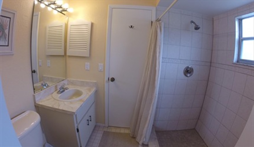 Master bath facing north with walk-in shower. Luxury villa, 3 Bedrooms, 2 Baths with stunning pool and games room in Indian Ridge, Kissimmee, Orlando