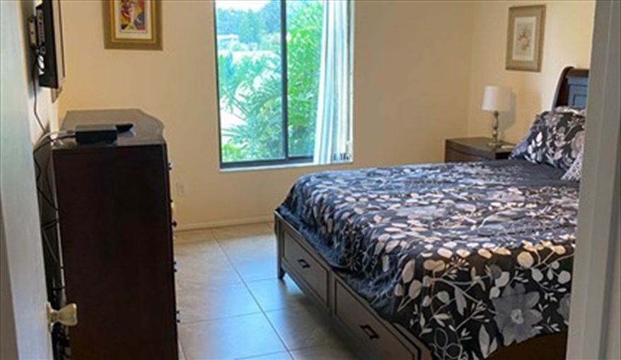 Master bedroom with King size bed and TV.. Luxury villa, 3 Bedrooms, 2 Baths with stunning pool and games room in Indian Ridge, Kissimmee, Orlando