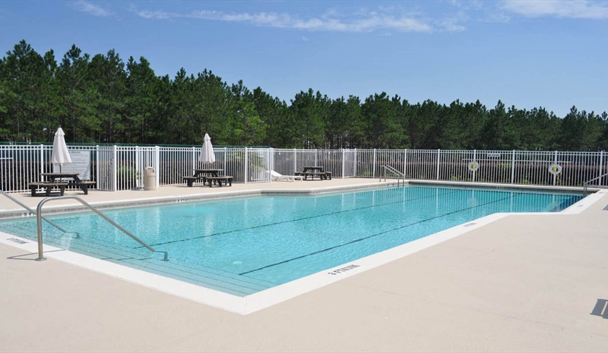 Community swimming pool. Only You Florida Villa. Highlands Reserve Golf Community former showhome with HUGE master suite and gamesroom in Highlands Reserve, Davenport, Orlando
