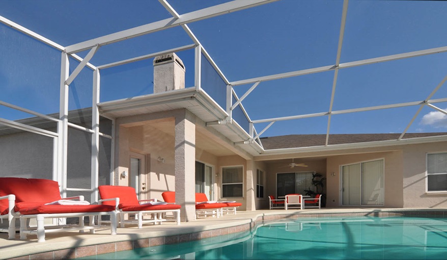 Swimming pool deck outside diner with cooling fan. Only You Florida Villa. Highlands Reserve Golf Community former showhome with HUGE master suite and gamesroom in Highlands Reserve, Davenport, Orlando
