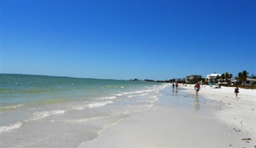 This is the beach just 8 minutes stroll away.. Island Villa with 33 Foot Infinity Pool, Dock, Dolphin Visits in Fort Myers Beach, Fort Myers, Gulf Coast