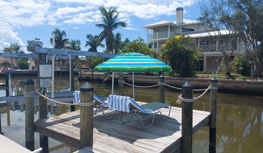 Dock, ideal for tieing up rental boats, relaxing or fishing. Direct sea access.. Island Villa with 33 Foot Infinity Pool, Dock, Dolphin Visits in Fort Myers Beach, Fort Myers, Gulf Coast