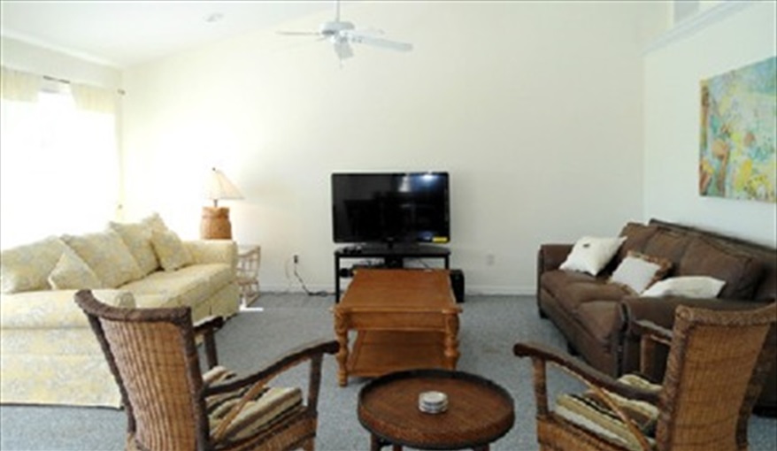 The open-plan lounge area. 50" HD television with cable, CD, DVD, surround sound cinema.. Island Villa with 33 Foot Infinity Pool, Dock, Dolphin Visits in Fort Myers Beach, Fort Myers, Gulf Coast